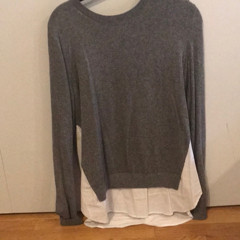 Sweater with connected shirt